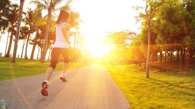 woman running sunny afternoon